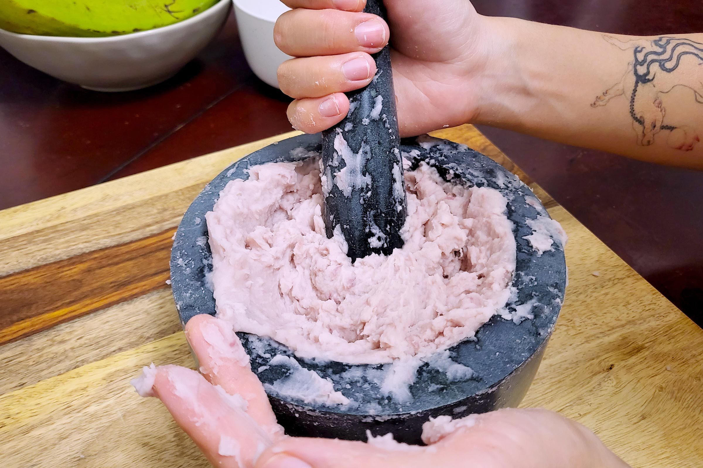 poi getting pounded with mortar and pestle
