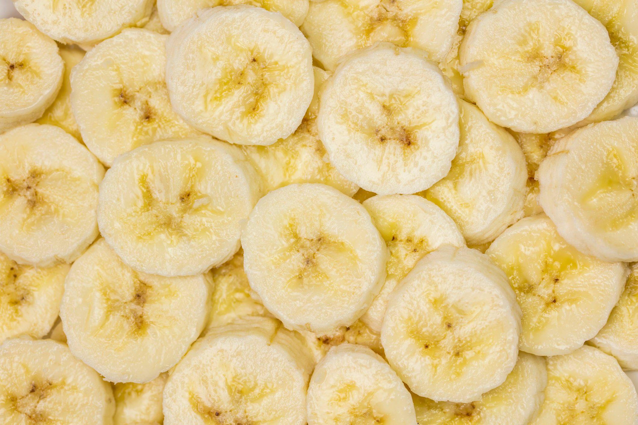 full frame of ripe sliced bananas