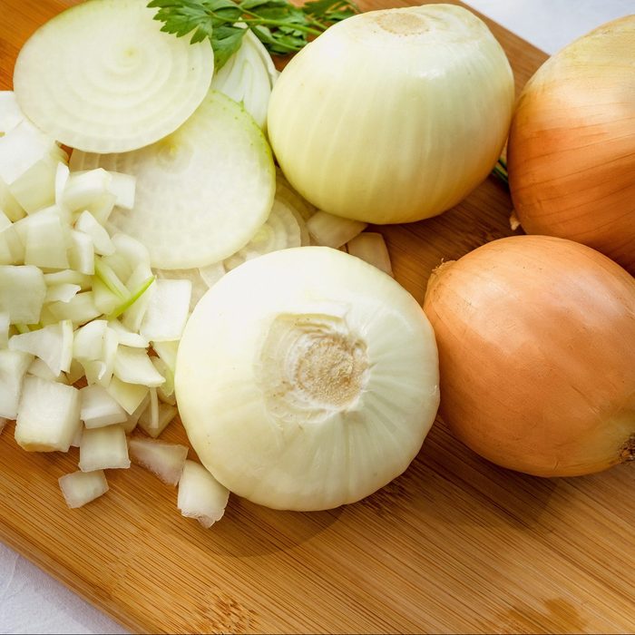 Chopped Onion On Cutting Board