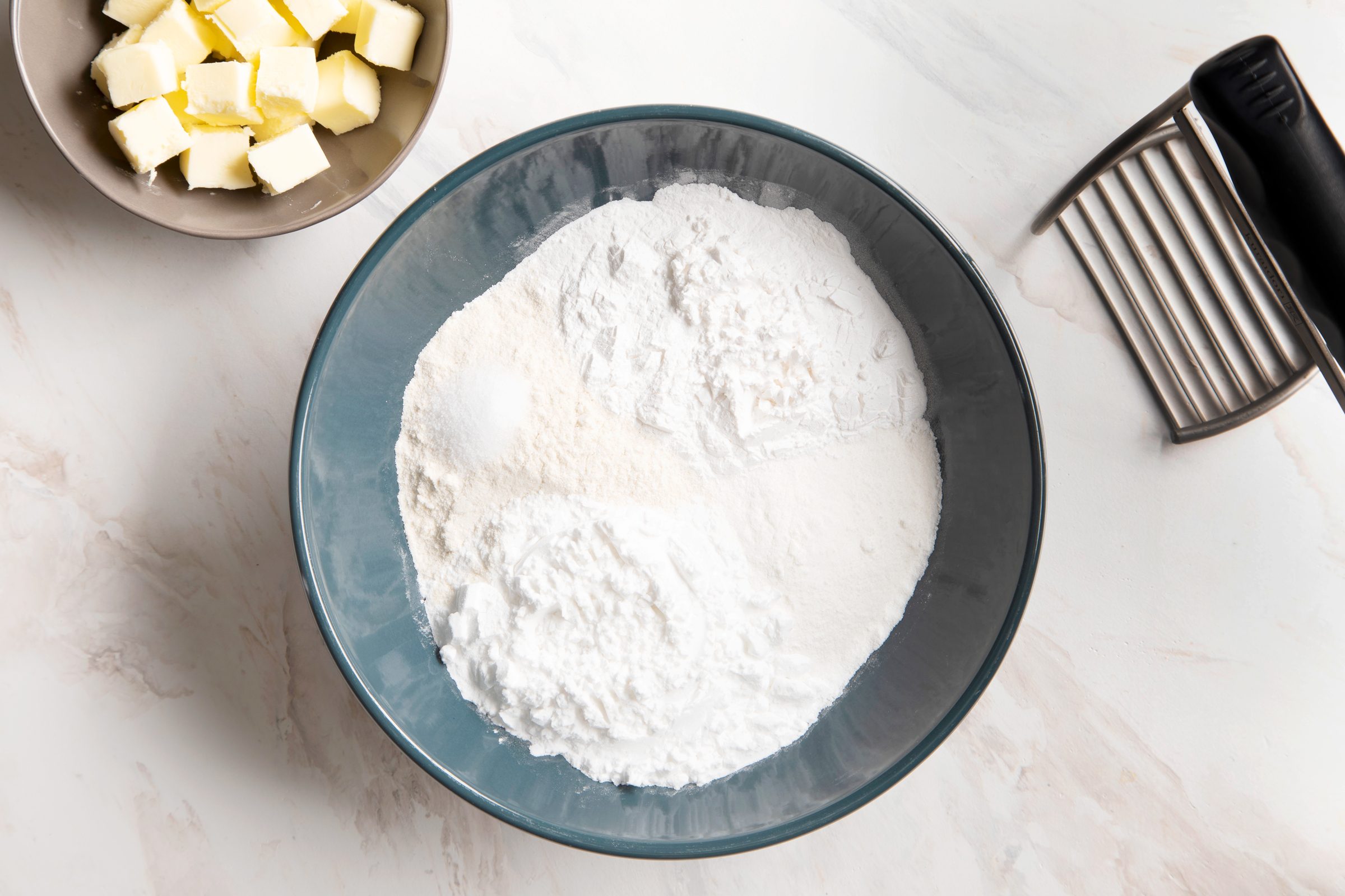 fork in a bowl of dry ingredients for a gluten free pie crust