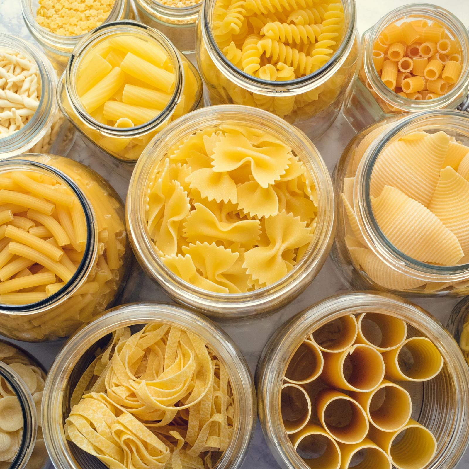 Variety Of Shapes Of Italian Pasta in glass jars