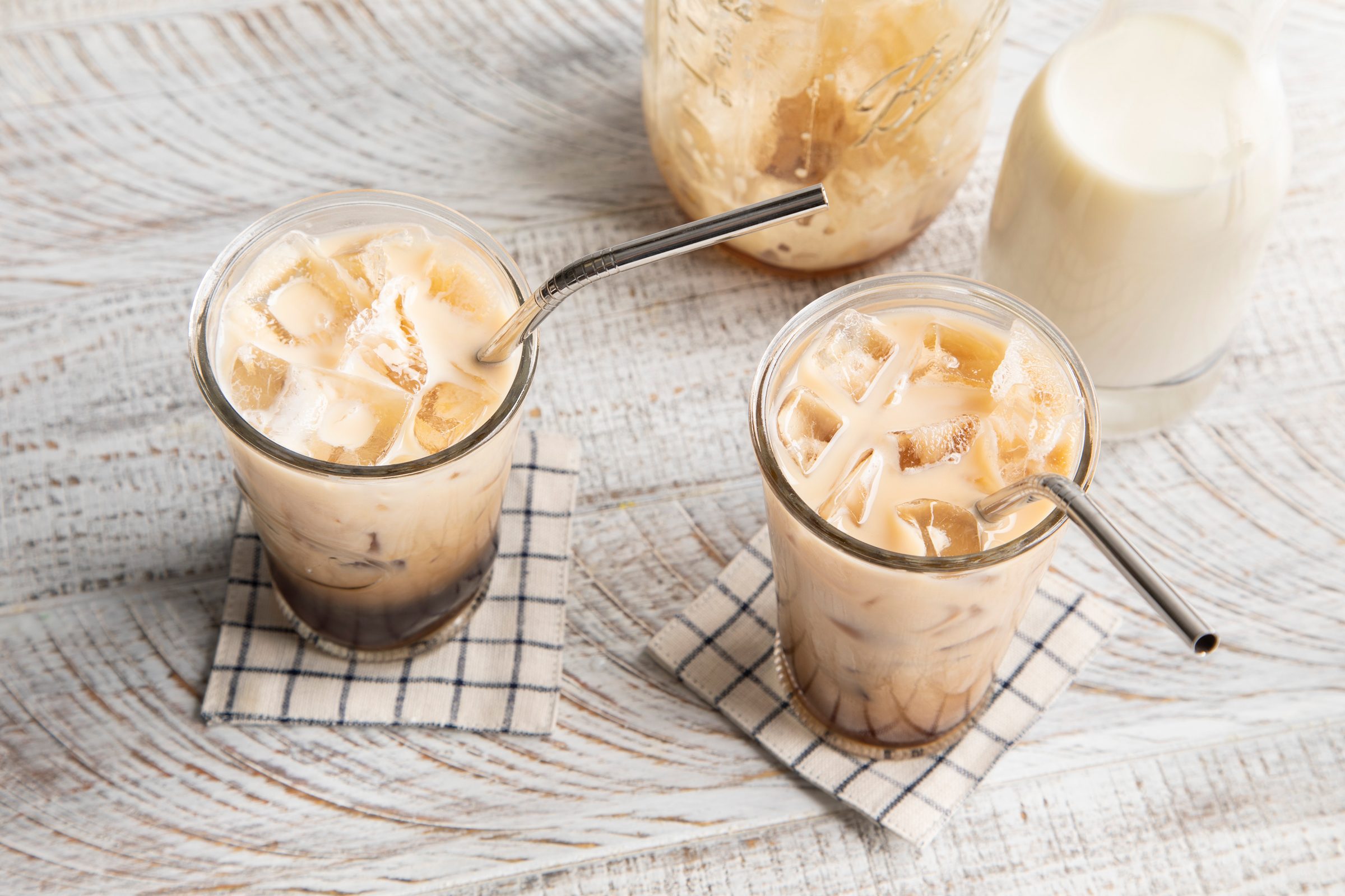 top view of two Starbucks shaken espresso in clear glasses with metal straws