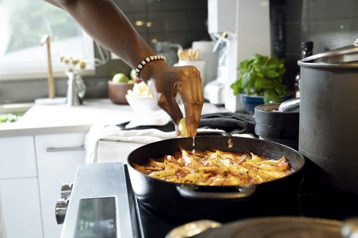 Close up of man cooking in kitchen