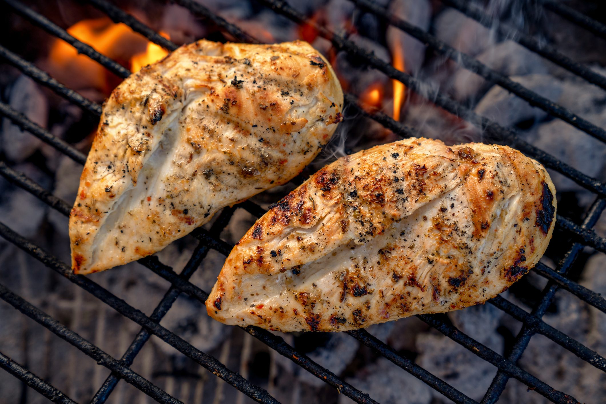 Video Clip Of Juicy Seasoned Chicken Breasts, Pollo Asado On A Hot Charcoal Grill