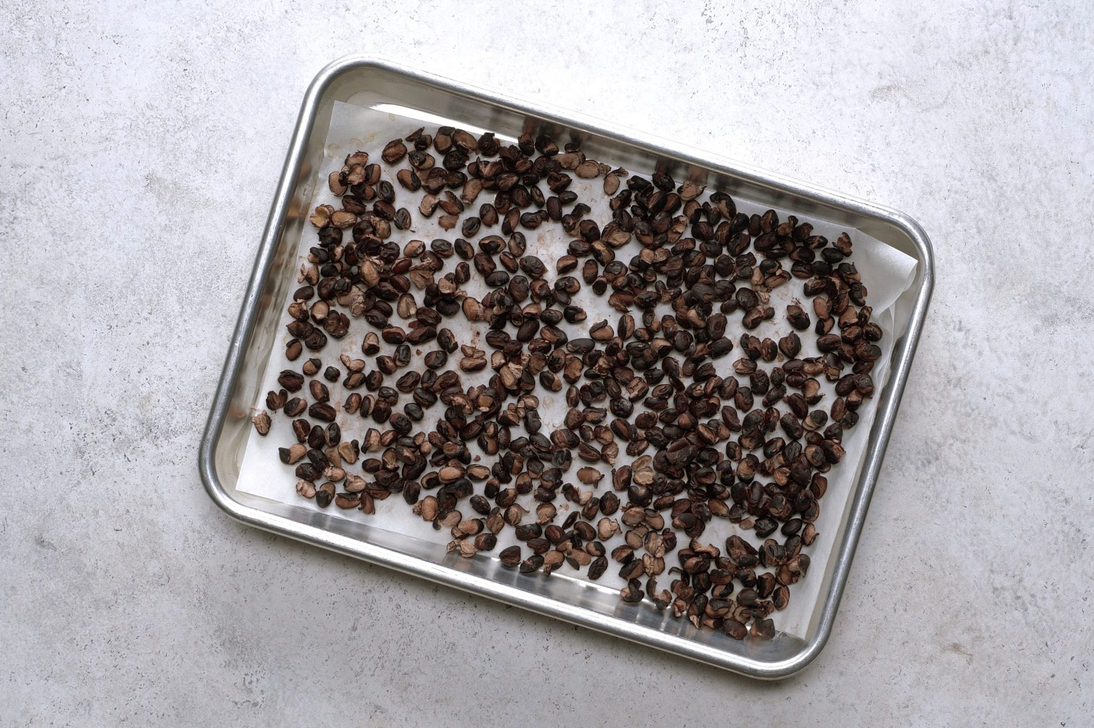 Black beans on baking sheet