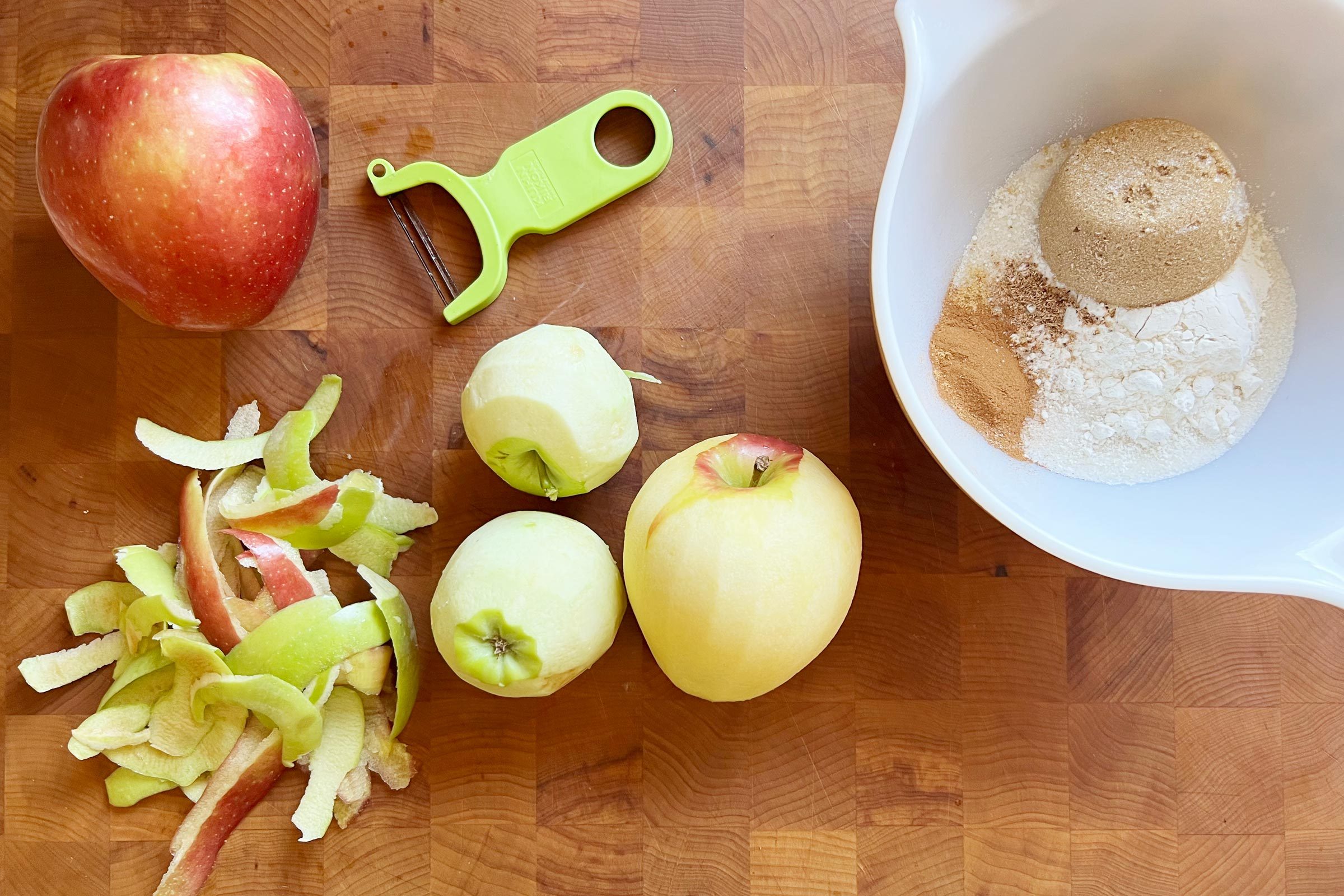 peeling apples and making filling for apple pie