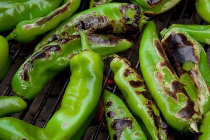 Hatch Chiles roasting over a fire