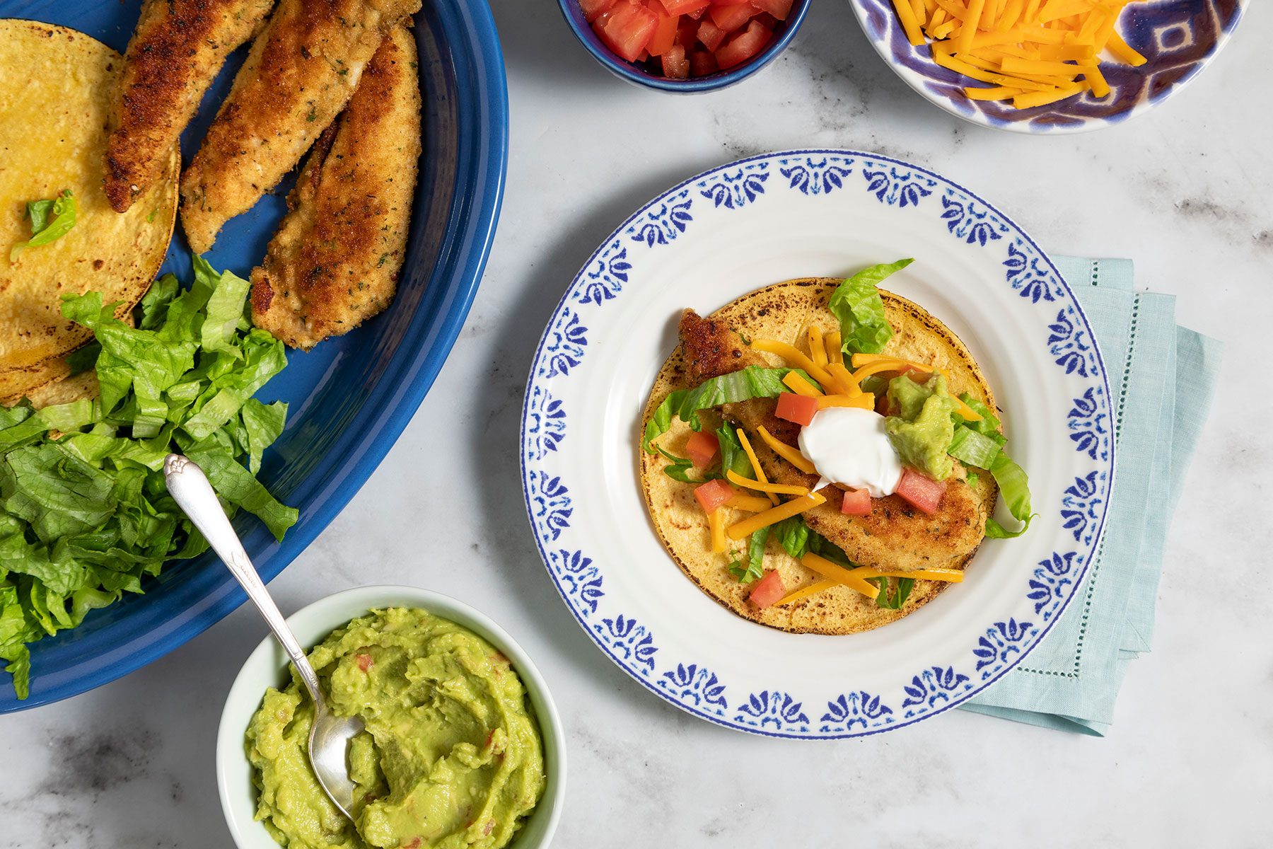 Fried Chicken Tacos with cheddar cheese