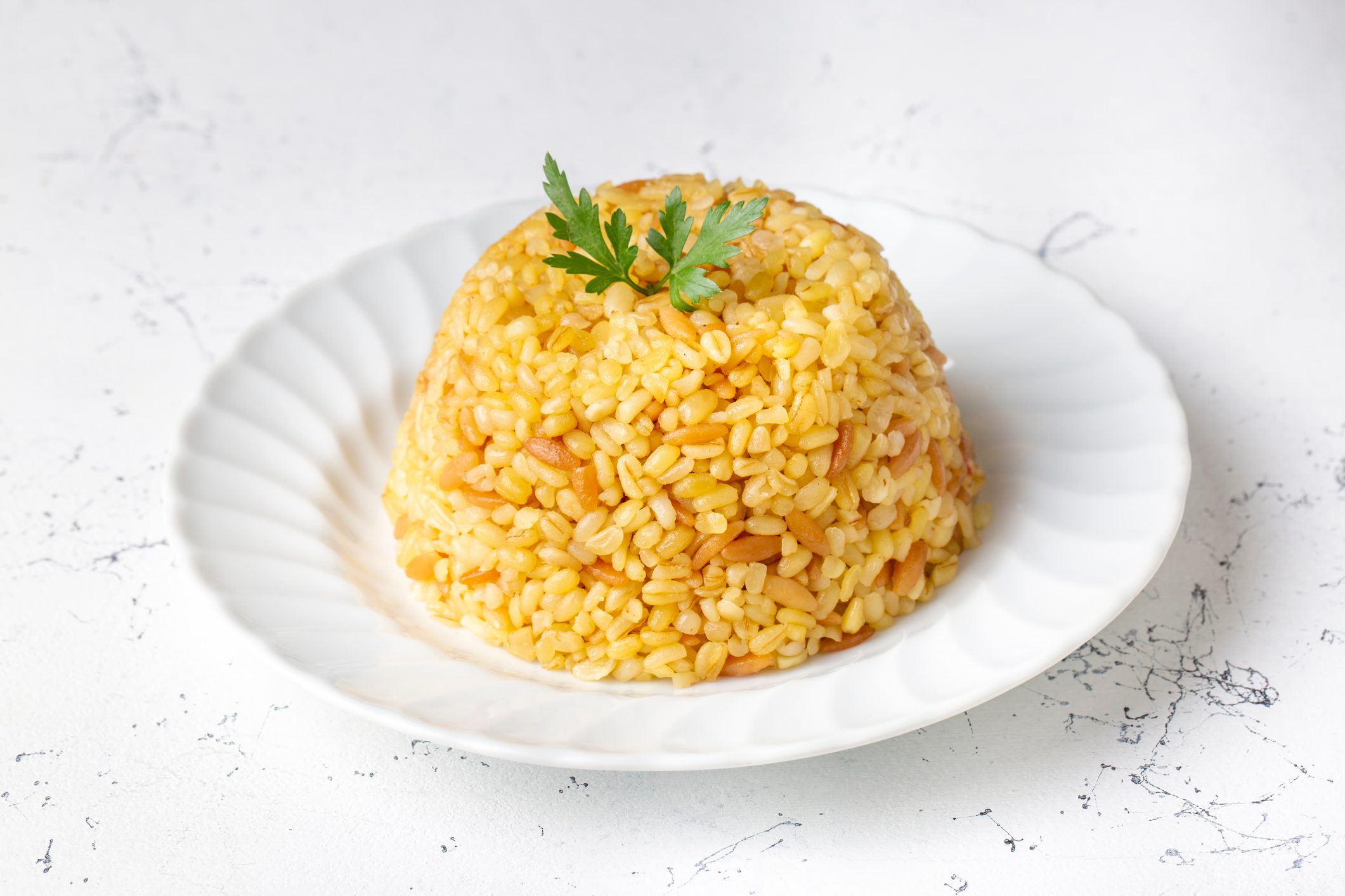 Traditional delicious Turkish food, bulgur pilaf with vermicelli (Turkish name; arpa sehriyeli bulgur pilavi)