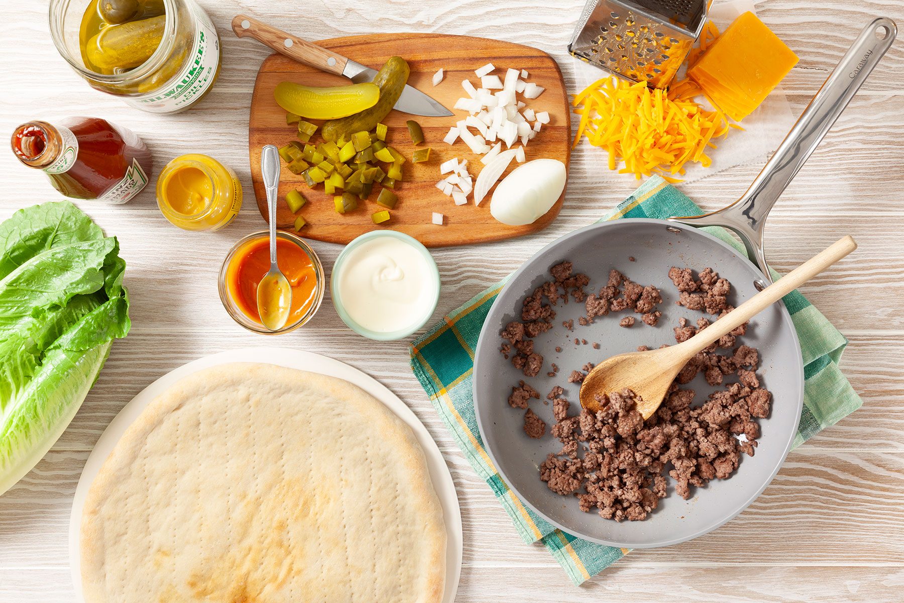 Ingredients for Cheeseburger on table
