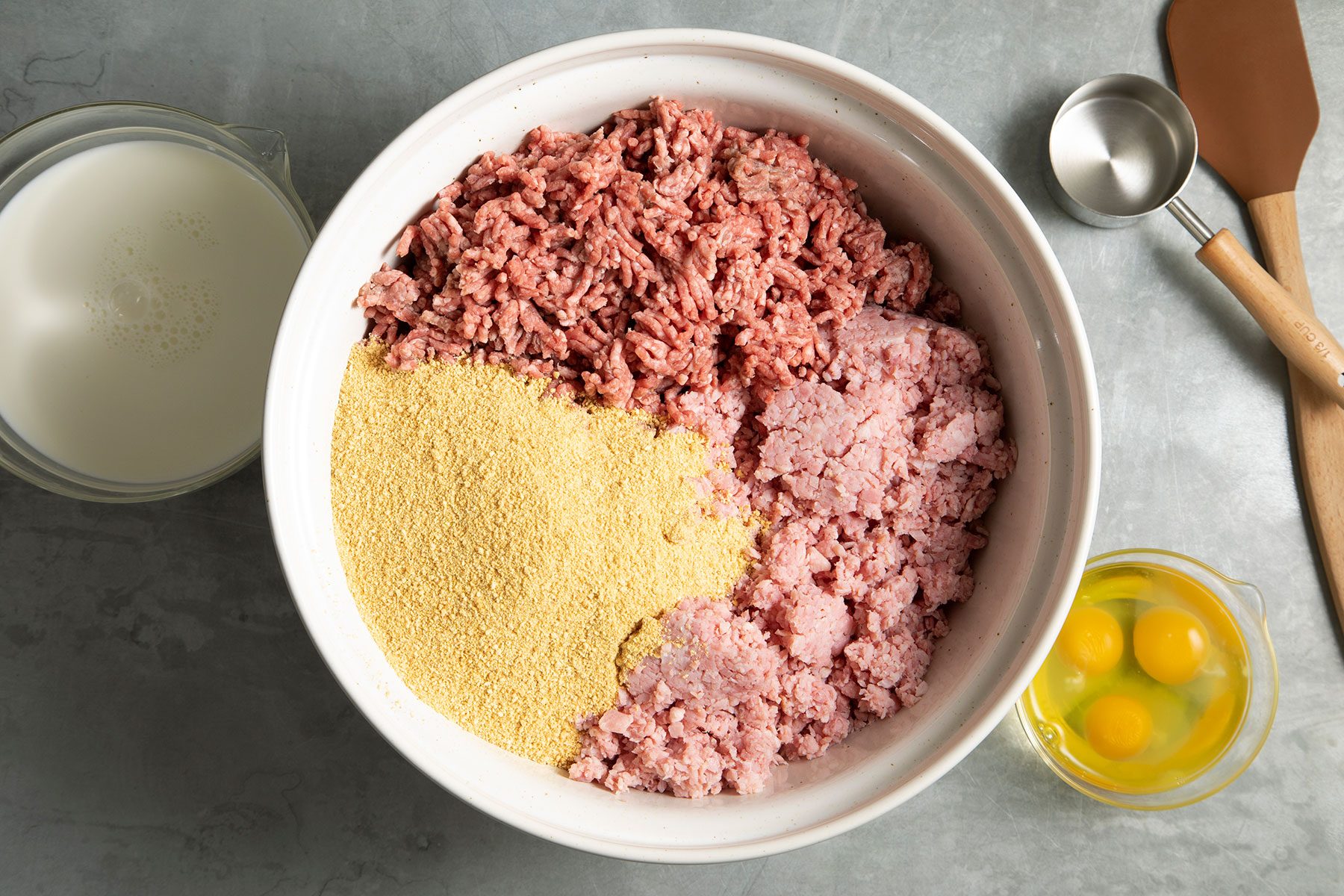 Mixing meat with ingredients