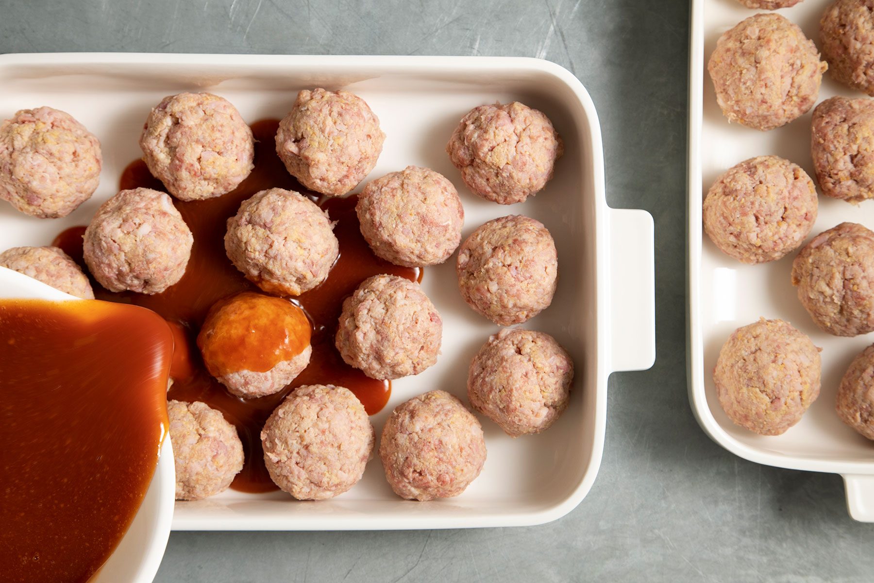 Pouring sauce over ham balls