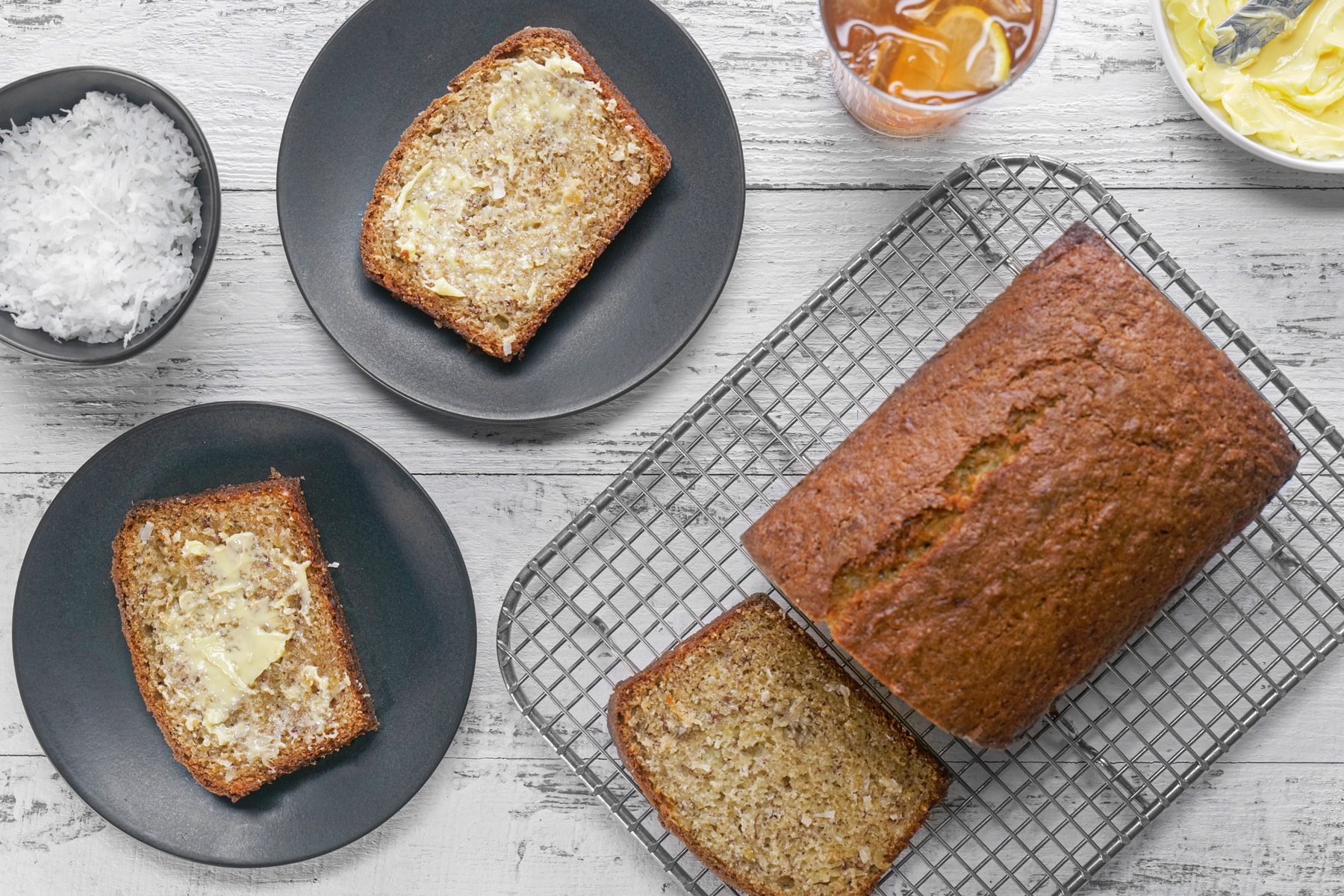 A loaf of Hawaiian Banana Bread on a cooling wire rack