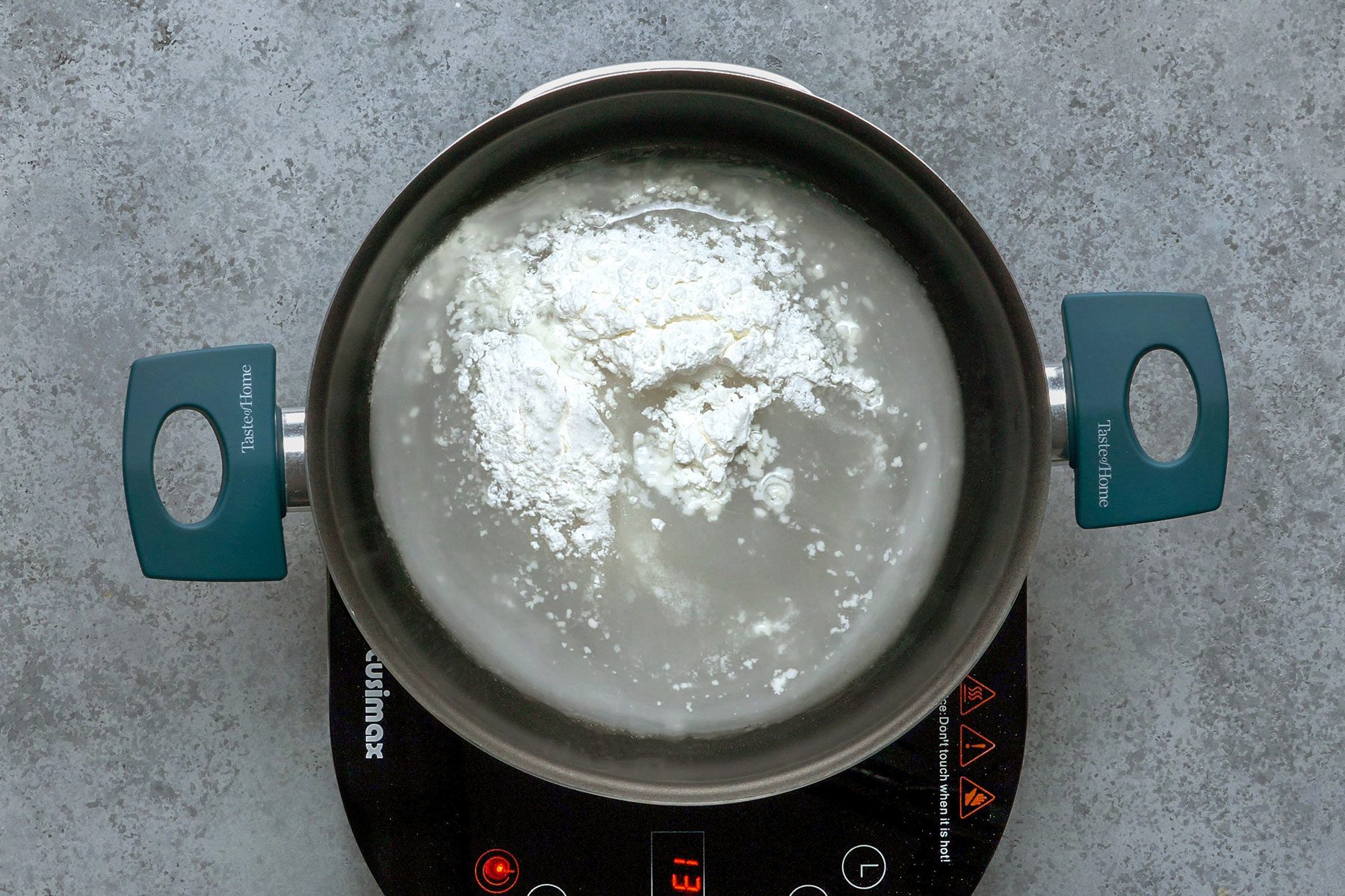 Ingredients in sauce pan over heat