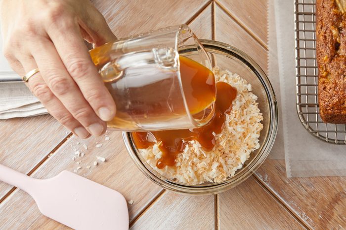 Stir the coconut with caramel sundae syrup and sea salt in a small bowl