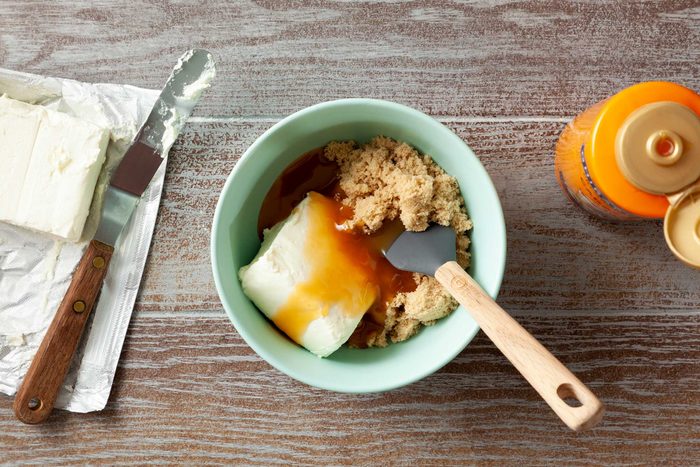Combine the cream cheese, brown sugar and caramel ice cream in a small bowl