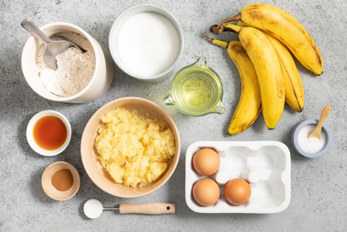 Banana Pineapple eggs and other ingredients arranged on a marble countertop
