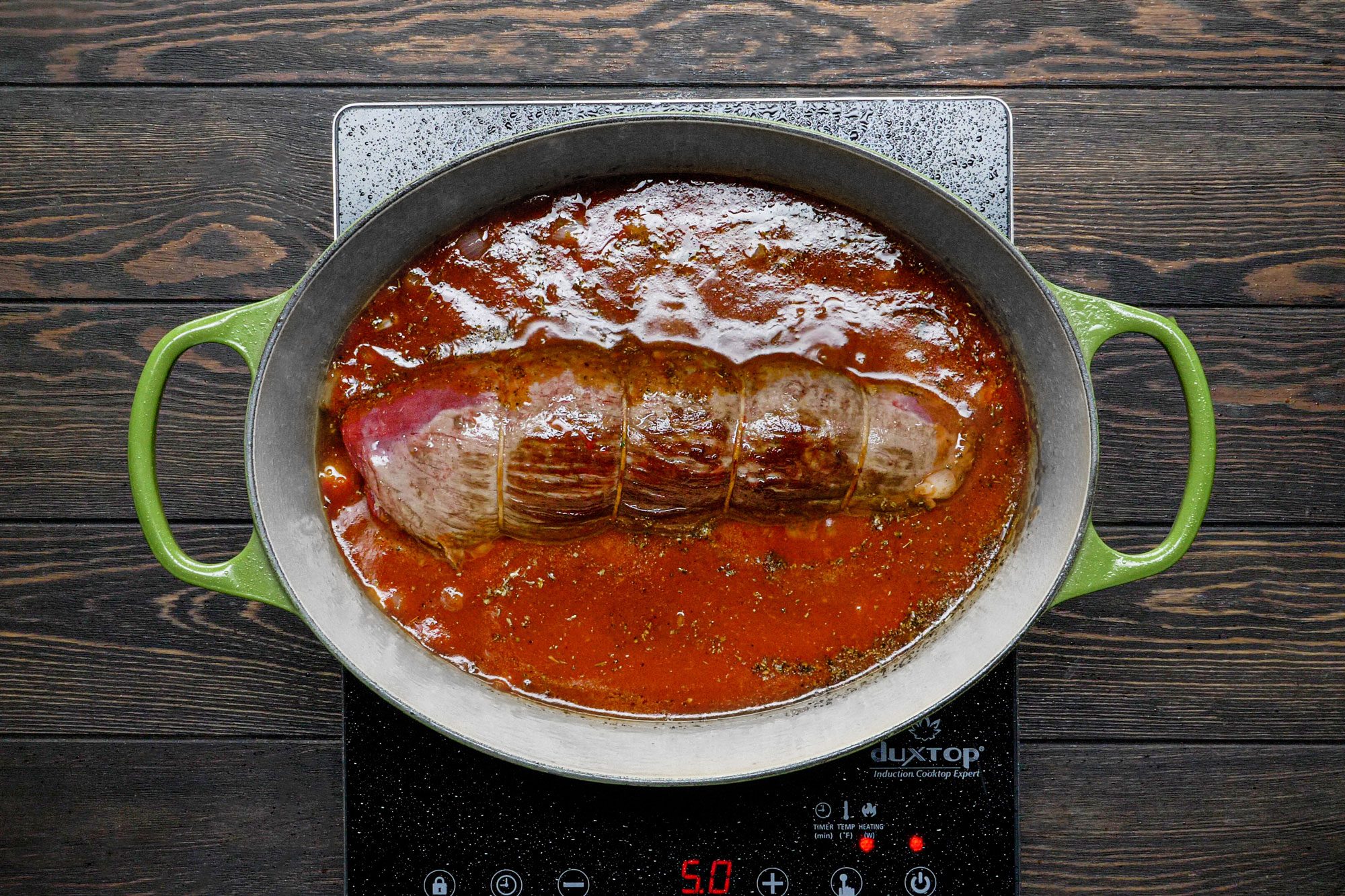 Stir in the steak with tomato sauce, water, Italian seasoning, sugar and the remaining salt and pepper in the pan