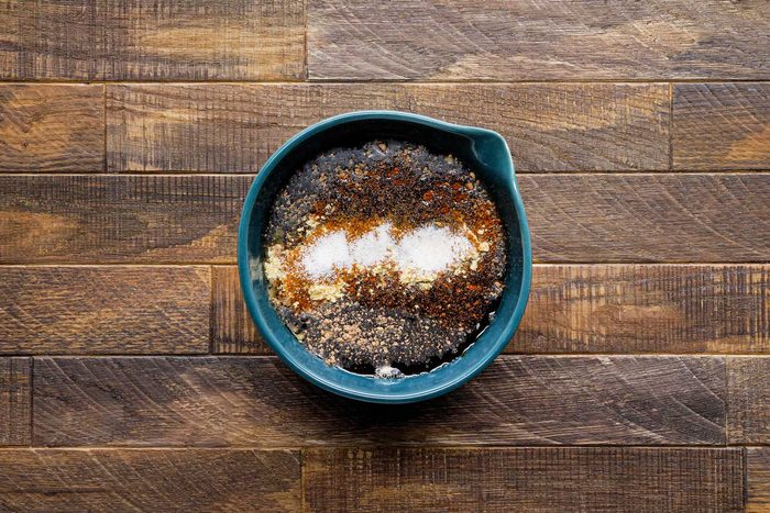 Combine the water, Worcestershire sauce, vinegar, garlic, bouillon, chili powder, mustard, cayenne and garlic salt in a small bowl