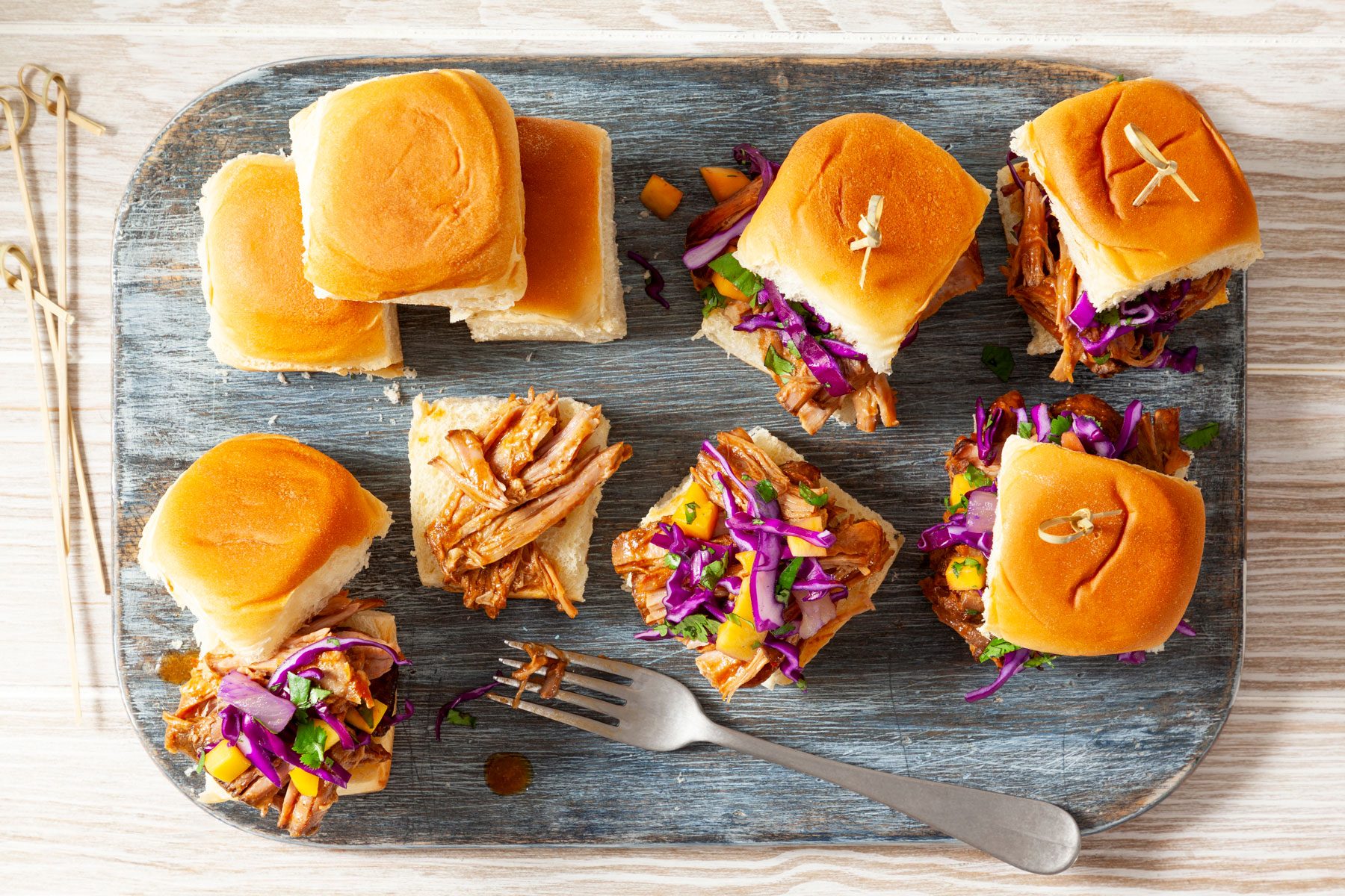 Caribbean Chipotle Pork and a fork placed on a marble