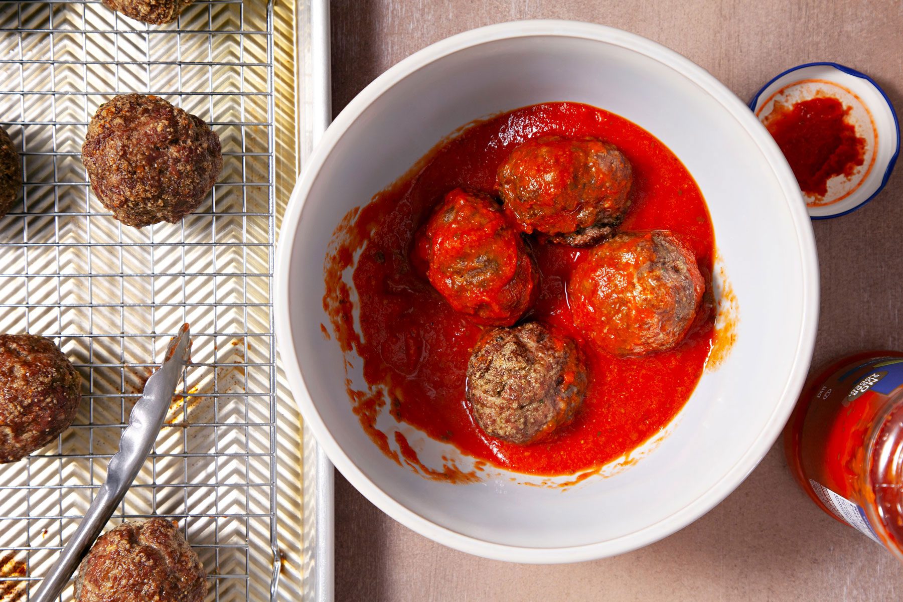 Meet balls in a red sauce in a large bowl