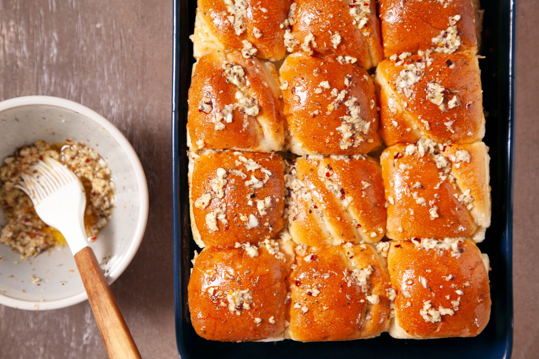 Cheesy Meatball Sliders in a baking tray before baking