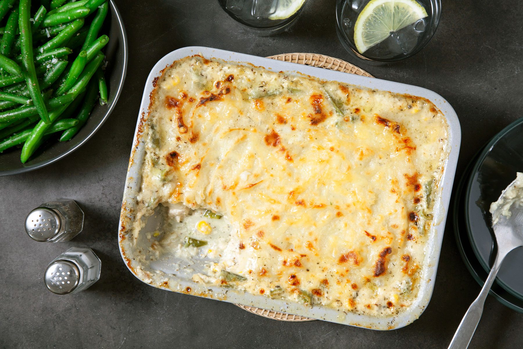 Chicken Shepherds Pie served in a baking tray with other vegetables