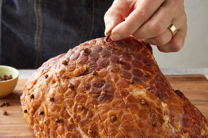 Insert a whole clove in the center