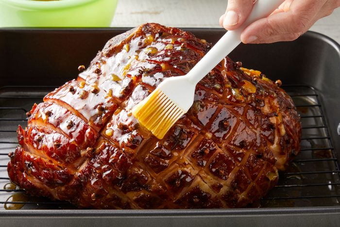 Glaze the ham with brush