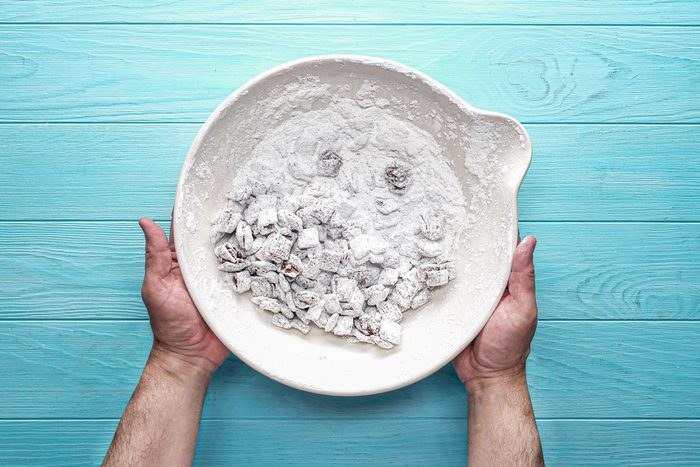 In a large container shake the cereal with sugar