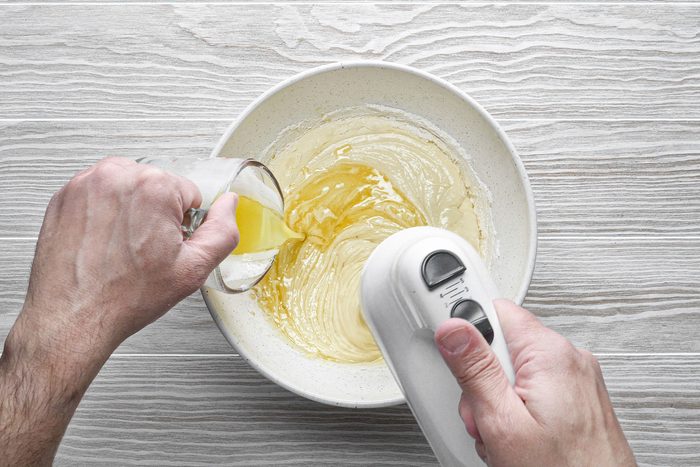 Adding mixture in large bowl