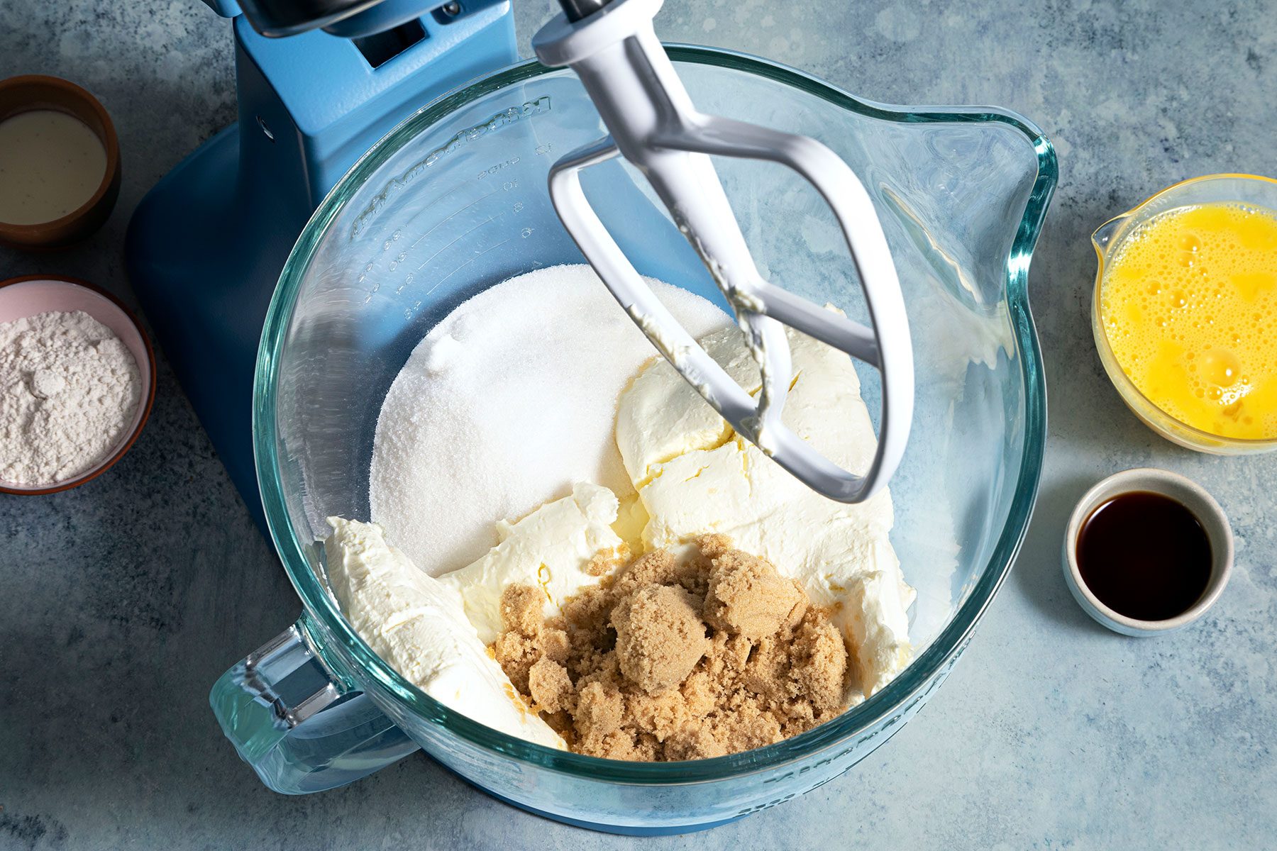 Beating cream cheese and sugar in a large bowl
