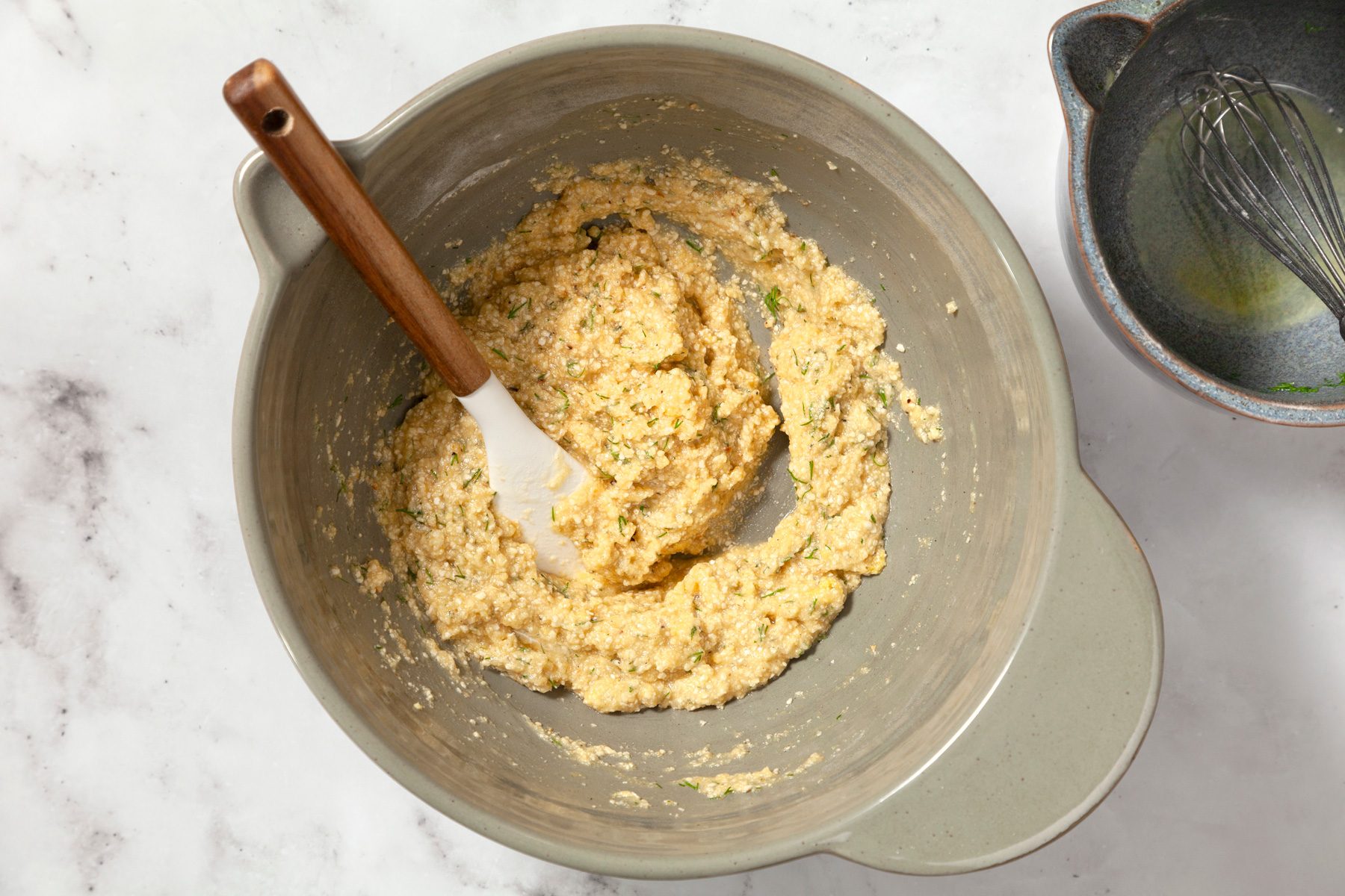 A bowl of mixture with a spoon