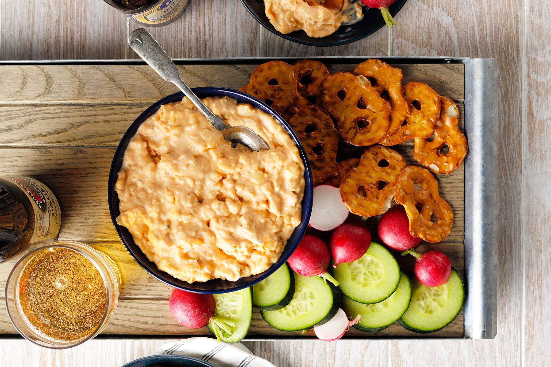 Obatzda served in bowl with vegetables on the side