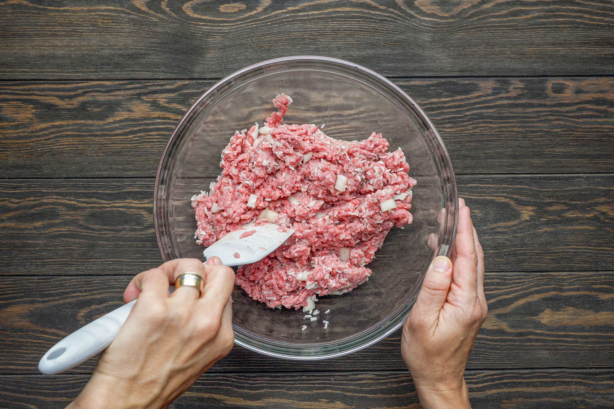 Add the ground beef and mix well in a bowl
