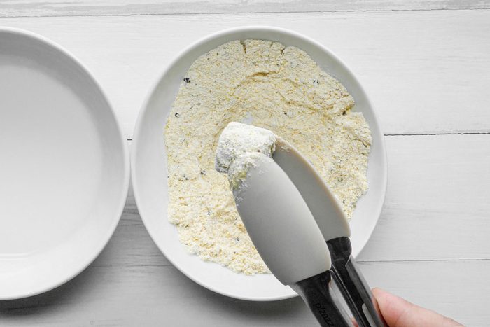 Roll the okra in cornmeal mixture