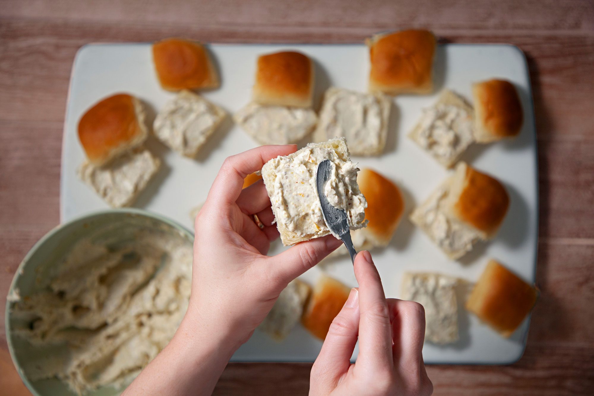 Spread the cream cheese mixture onto bottom of rolls