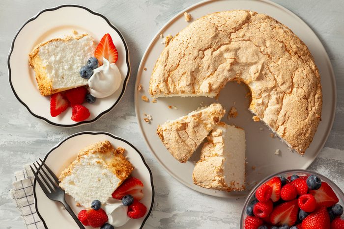 Angel Food Cake served with berries and cream