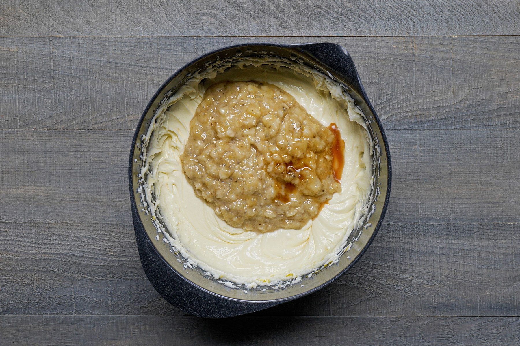 Adding Bananas and vanilla syrup in mixture