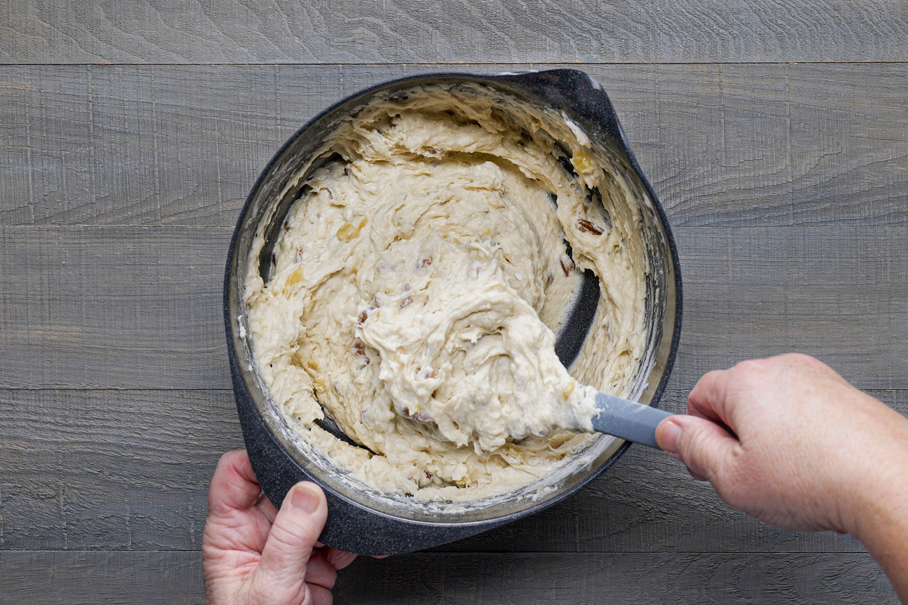Fold dry mixture with wet mixture in a large bowl