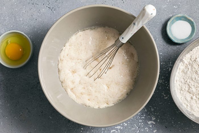 Whisking wet ingredients in large bowl