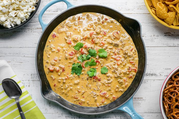 Rotel Dip served in a large pan on a wooden surface