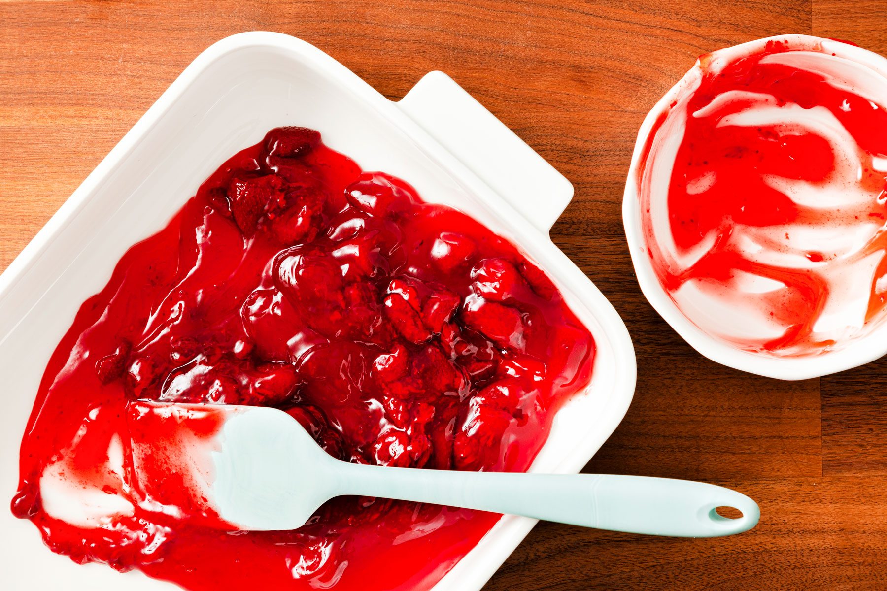 Strawberry pie filling in a baking pan
