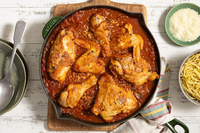 Chicken Cacciatore in skillet with cheese