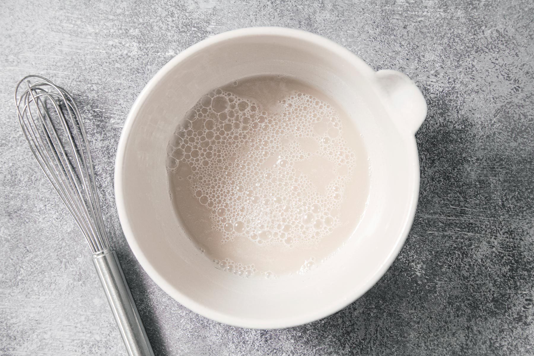 Dissolving the yeast in small bowl