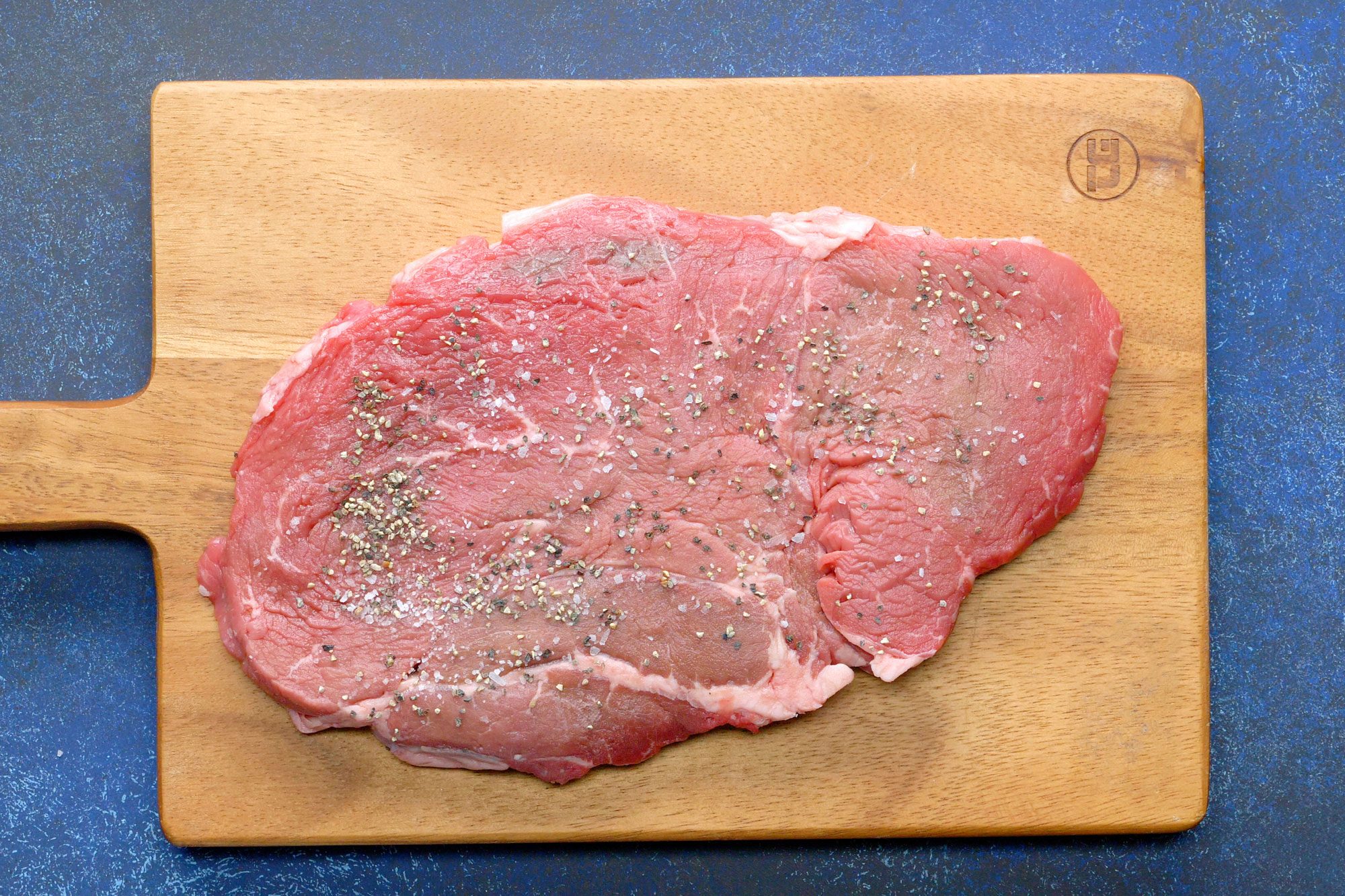 Sprinkle the steak with salt and pepper