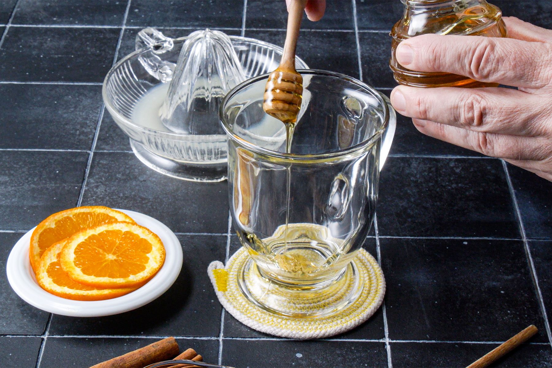 Pouring Honey in large mug