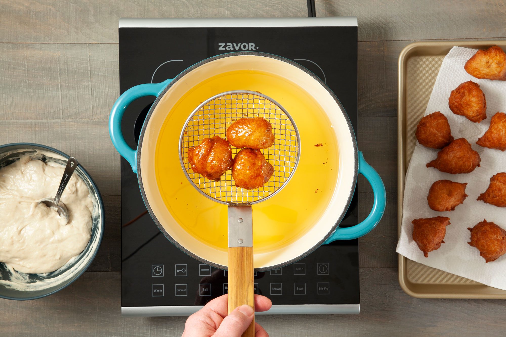Frying Loukoumades (Greek Doughnuts) in Boiling Oil