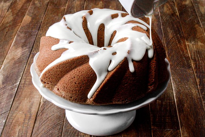 Drizzling Icing over Olive Oil Cake