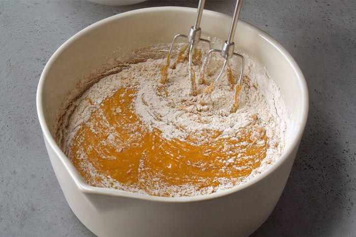 combined flour, cinnamon, baking soda and salt in a large bowl; gradually beating into pumpkin mixture until blended; blending machine